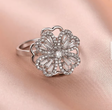 ANILLO TREBOL PLATEADO GIRATORIO